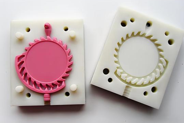 Two-cavity mold for the outer handle.
